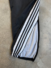 Load image into Gallery viewer, 2000s Adidas Black Nylon Windbreaker Side-Zip Track Pants (XL)
