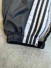 Load image into Gallery viewer, 2000s Adidas Black Nylon Windbreaker Side-Zip Track Pants (XL)
