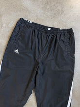 Load image into Gallery viewer, 2000s Adidas Black Nylon Windbreaker Side-Zip Track Pants (XL)
